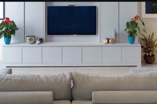 "Sleek living room with clean lines and natural light."