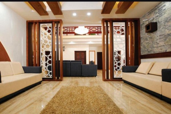 "Modern living room with minimalist furniture and large windows."