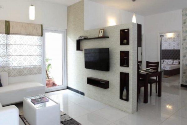 "Minimalist living area with bright and airy feel."