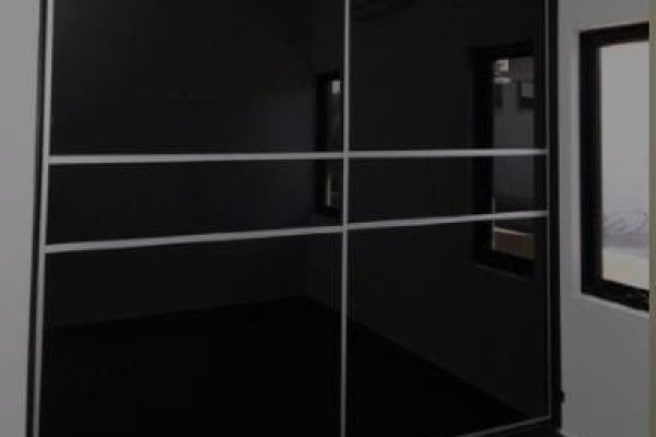 "Smart Storage with The Corner Story: #CornerWardrobe #HomeOrganization #SpaceOptimization"